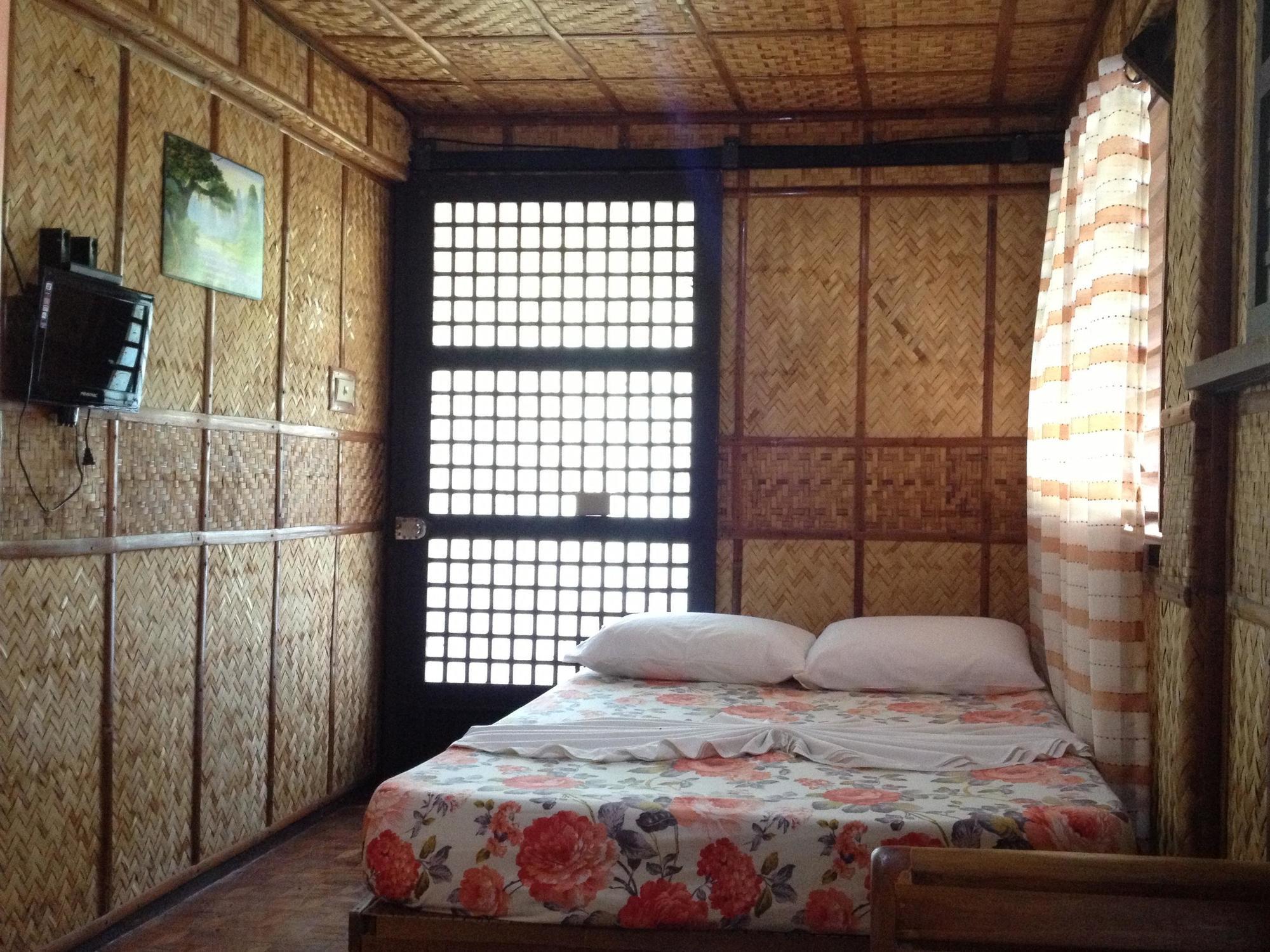 Bamboo House Beach Lodge & Restaurant Пуэрто-Галера Экстерьер фото